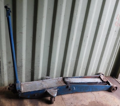 Lot 544 - A trolly jack, 70cm high, 150cm wide, 45cm...