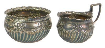 Lot 293 - A Victorian silver cream jug and sugar bowl,...