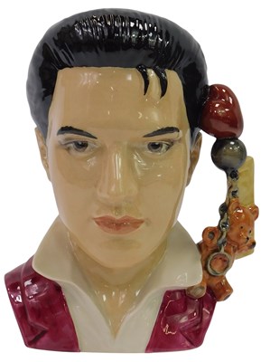 Lot 185 - A Peggy Davies character jug modelled as The...