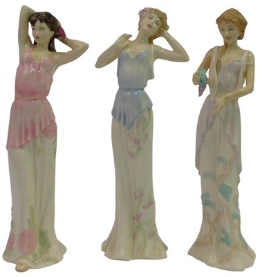 Lot 186 - Three Royal Doulton Impressions figures,...