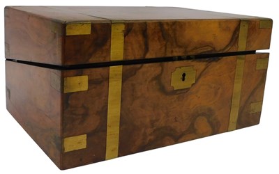 Lot 188 - A Victorian walnut and brass bound writing...