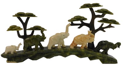 Lot 193 - A carved hardstone figure group, of arched...