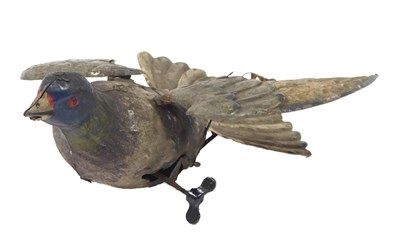 Lot 127 - An early 20thC tinplate clockwork pigeon,...