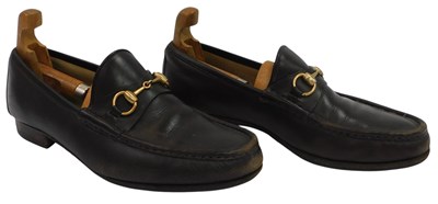 Lot 199 - A pair of Gucci horse bit brown leather...