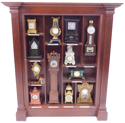 Lot 351 - Twelve Franklin Mint miniature clocks from the...
