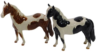 Lot 355 - A Beswick Skewbald Pinto pony, 17cm high, and...