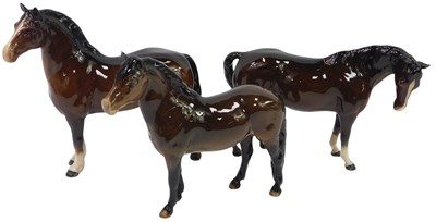 Lot 359 - Two Beswick brown glaze horses, 18cm high and...