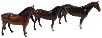 Lot 361 - Three Beswick brown glaze horses, 17cm high.