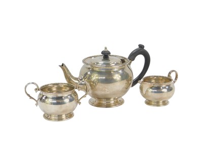 Lot 403 - A Victorian three-piece tea set, each of...