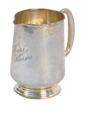 Lot 416 - A 20thC silver milk jug, engraved Cari March...