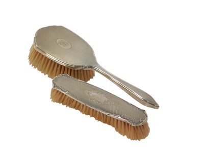 Lot 418 - A George V silver mounted hairbrush, initial...
