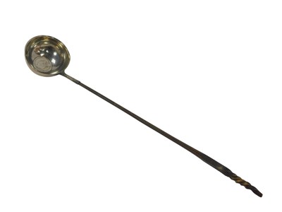 Lot 422 - A Georgian white metal toddy ladle, the bowl...