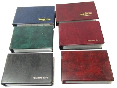 Lot 432 - Six albums containing cigarette cards, to...