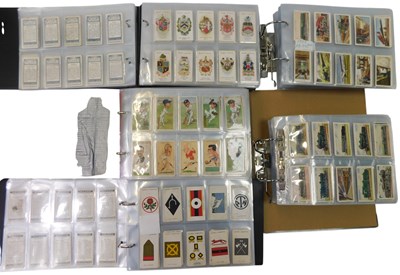 Lot 434 - Five albums containing cigarette cards, to...