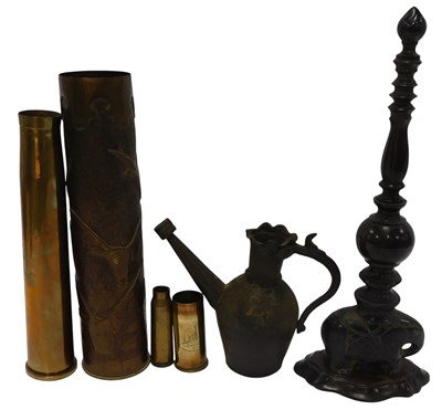 Lot 455 - A group of metalware, to include a shell case,...