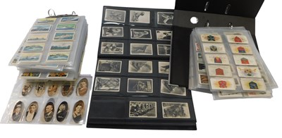 Lot 473 - Three albums containing cigarette cards, to...