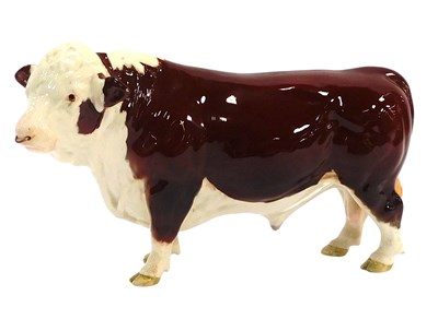 Lot 478 - A Beswick pottery figure of a Hereford bull,...