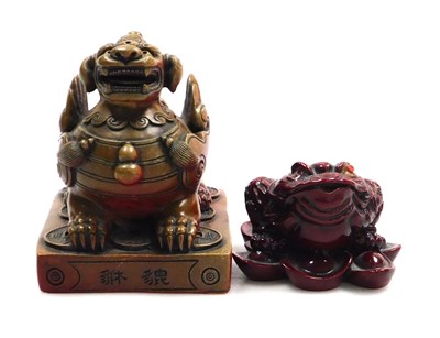 Lot 2233 - A Chinese resin figure of a temple dog, and a...