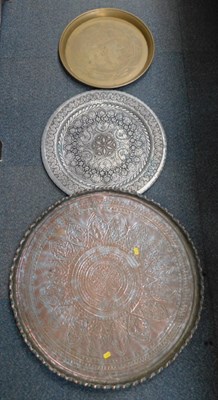 Lot 2056 - A large brass Indian tray, a silvered tray,...