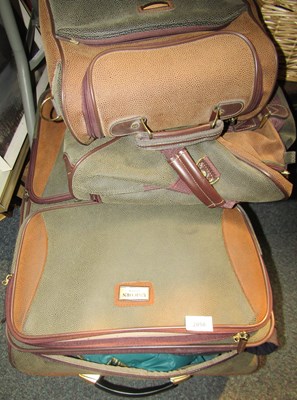 Lot 2058 - Luggage bags and textiles. (a quantity)