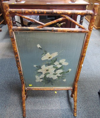 Lot 2064 - A bamboo framed fire screen (AF).