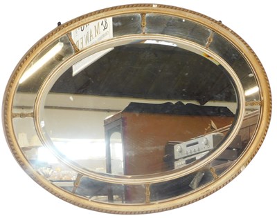 Lot 508 - A Georgian style giltwood wall mirror, of oval...
