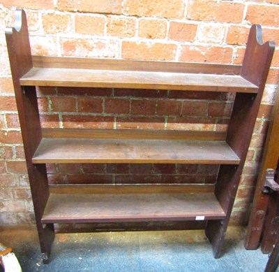 Lot 1083 - A three tier open bookcase.