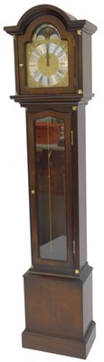Lot 560 - A 20thC oak longcase clock, the brass dial...