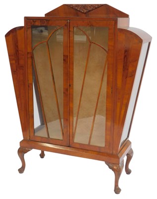 Lot 565 - An Art Deco mahogany and walnut display...