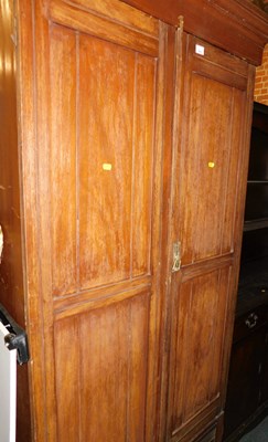 Lot 1025 - An early 20thC mahogany two-door wardrobe,...