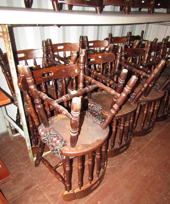 Lot 1121 - A set of twelve spindle back kitchen or pub...