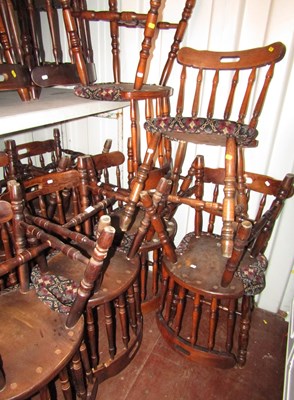 Lot 1122 - Twelve pub chairs, with spindle backs, turned...
