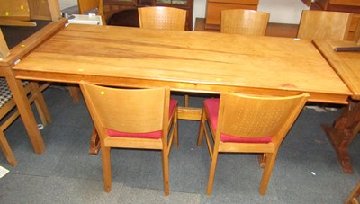 Lot 1127 - A walnut dining table, with four dining chairs,...