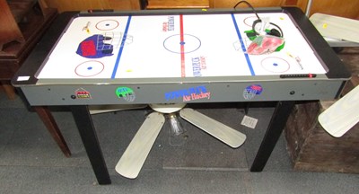 Lot 1130 - A Power Puck air hockey table.