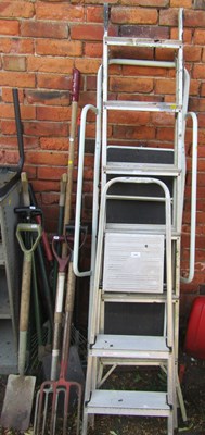 Lot 1141 - A set of aluminium step ladders, another set...