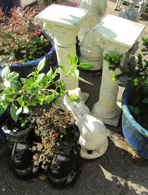 Lot 1148 - Two garden planters in the form of Easter...