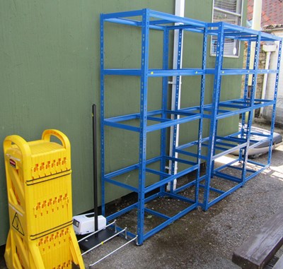Lot 1156 - Three Dexion shelving units, with wooden...