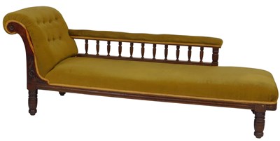 Lot 586 - A Victorian oak chaise longue, upholstered in...