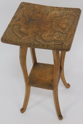 Lot 607 - A 20thC Liberty style two tier table, the...