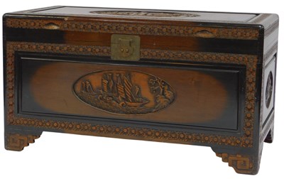 Lot 612 - A 20thC Chinese camphor wood chest, the top...
