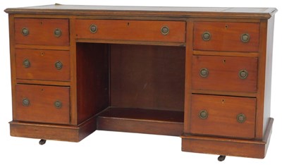 Lot 577 - An early 20thC mahogany kneehole desk, the top...