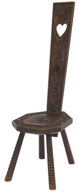 Lot 615 - An early 20thC Welsh carved oak spinning chair,...