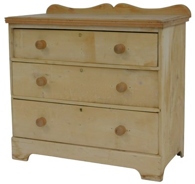 Lot 617 - A 20thC pine chest, of three long graduated...