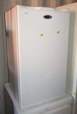 Lot 1104 - A Premi fridge, with freezer compartment to...