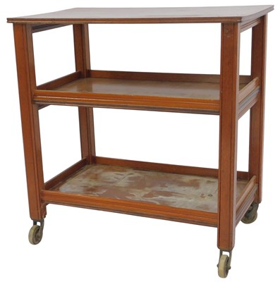 Lot 626 - An early 20thC oak three tier trolley, on...