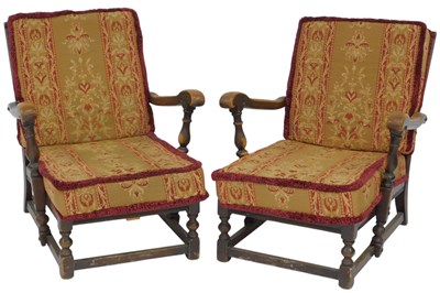Lot 583 - A pair of Ercol Old Colonial style lounge...
