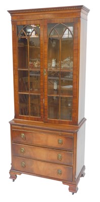 Lot 653 - A Georgian style mahogany bookcase on chest,...