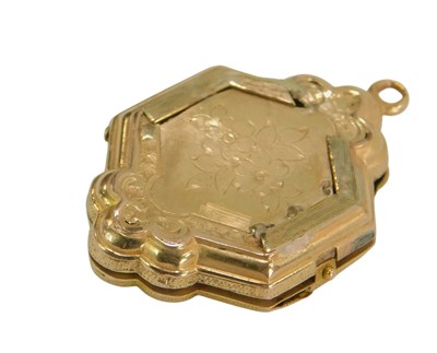 Lot 542 - A Victorian locket, bright cut decorated to...