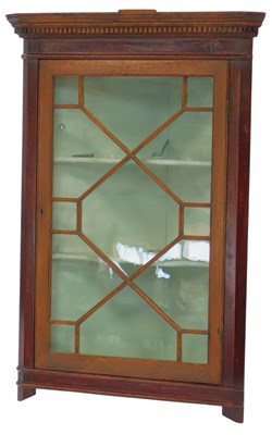 Lot 670 - An early 20thC oak hanging corner cabinet, the...