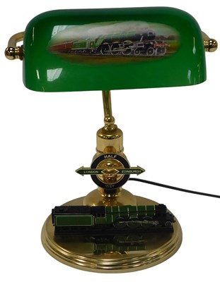 Lot 678 - A Flying Scotsman commemorative desk lamp,...